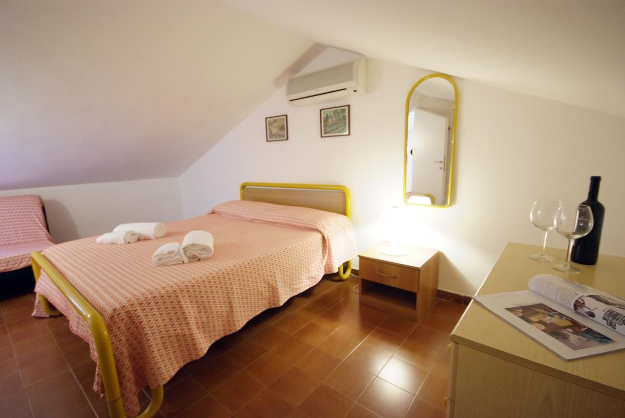 Residence Sud Est Porto Azzurro Buitenkant foto
