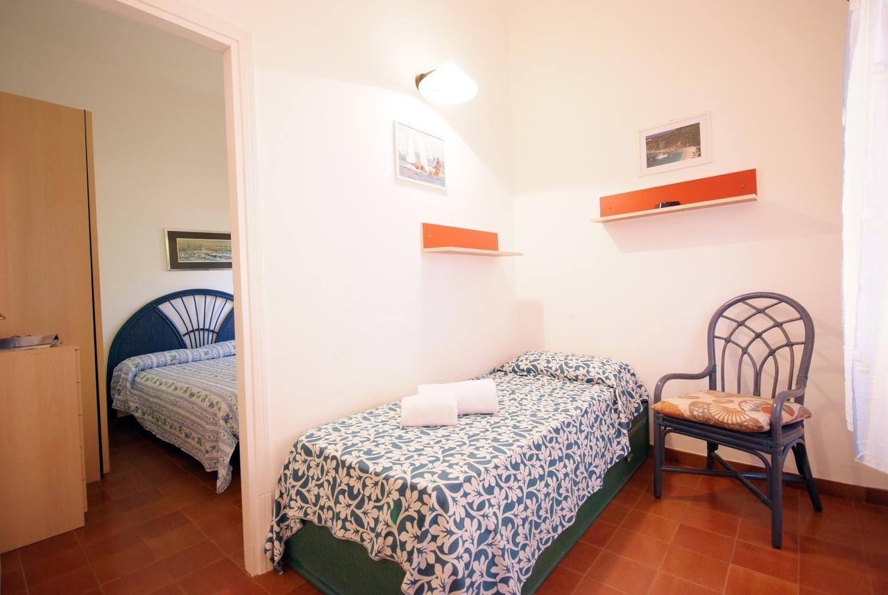 Residence Sud Est Porto Azzurro Buitenkant foto