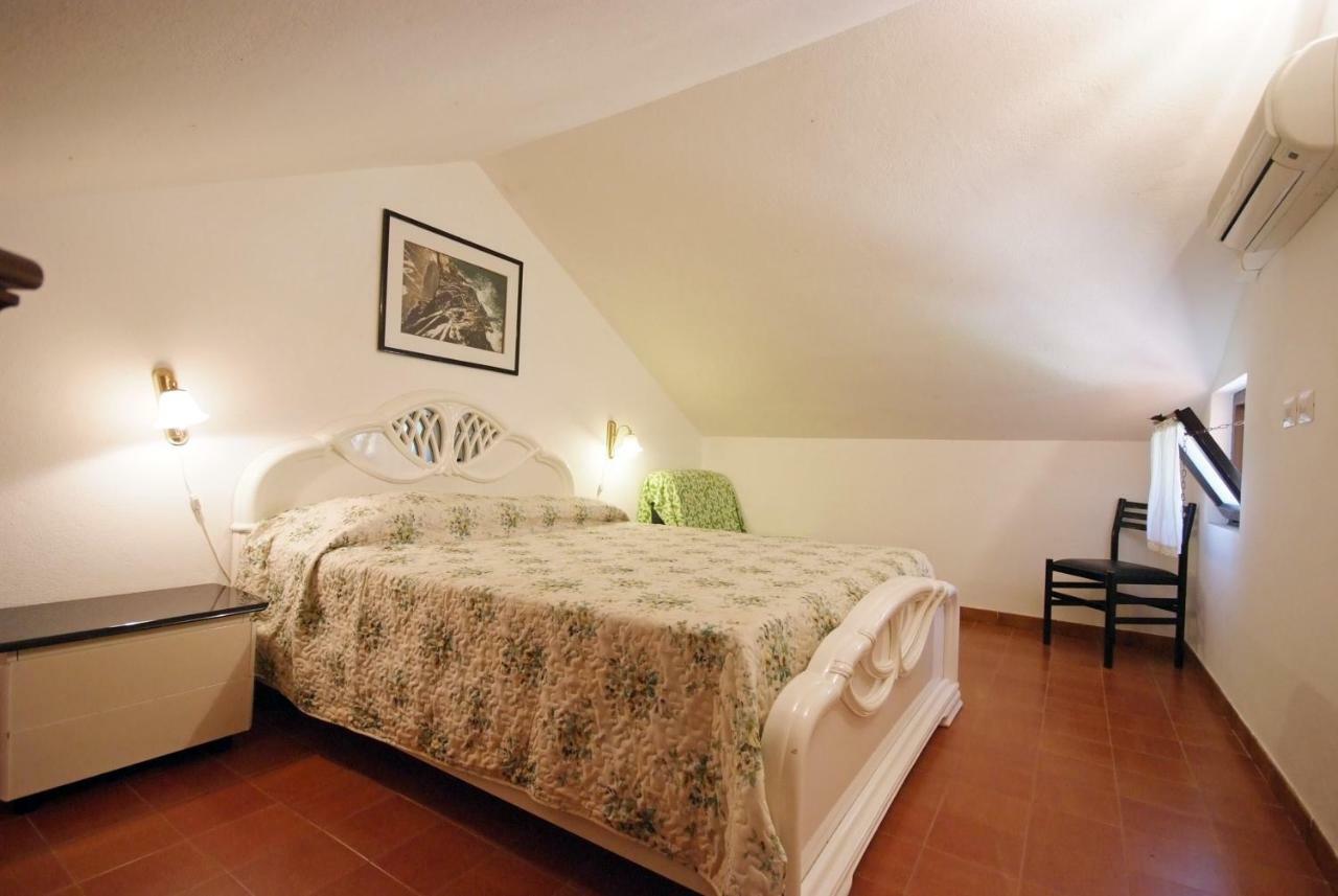 Residence Sud Est Porto Azzurro Buitenkant foto